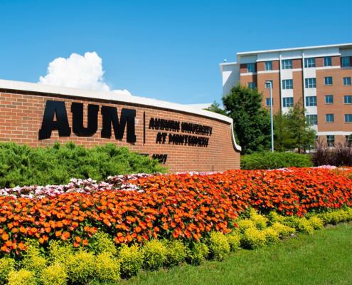 Auburn University at Montgomery Sports Alabama tourism college campus students baseball softball basketball volleyball soccer fields arena complex championship grass field pitching mound batters box bullpen goal net players athletes NCAA games tournament