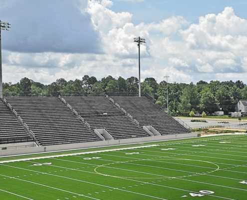 Rip Hewes Stadium Dothan Sports Alabama high school students football soccer team championship tournament winner touchdown field grass dugout league youth spectators seats ball game scoring