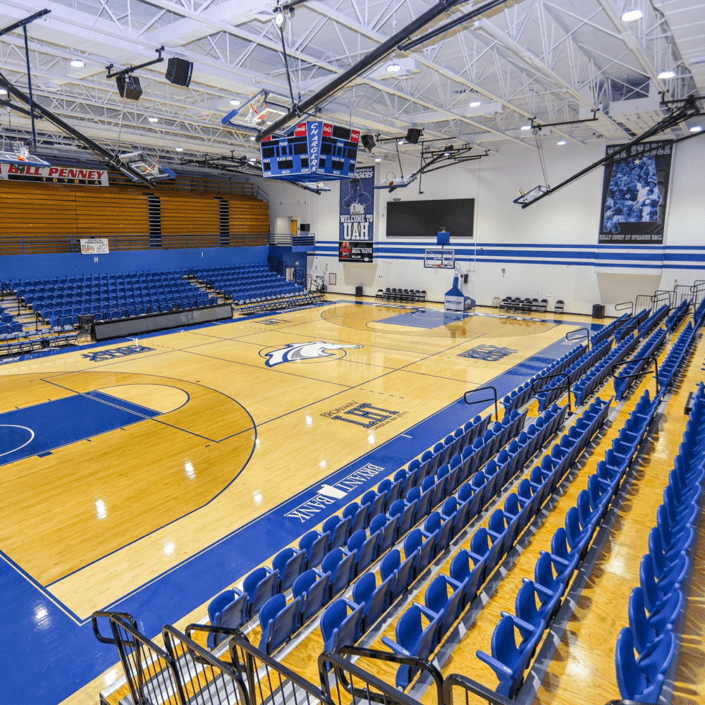 Spragins Hall The University of Alabama in Huntsville Sports Alabama campus students college division II NCAA tournament championship basketball volleyball cheer dance wrestling court mat floor score lay up dunk dribble team net serve match set tumbling dance stunt jumps routine contact sport opponent